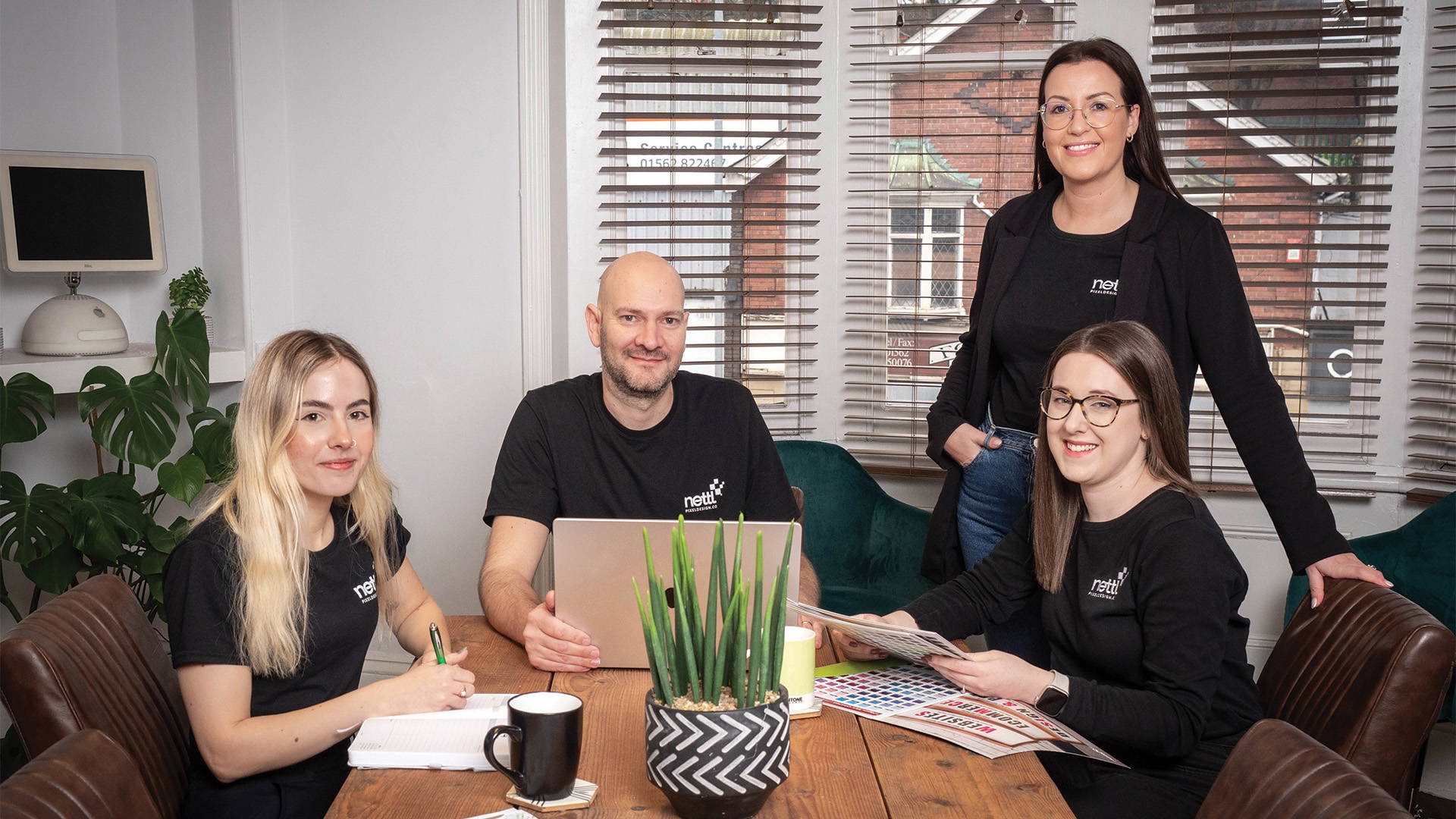 Designers meeting to discuss website user journey